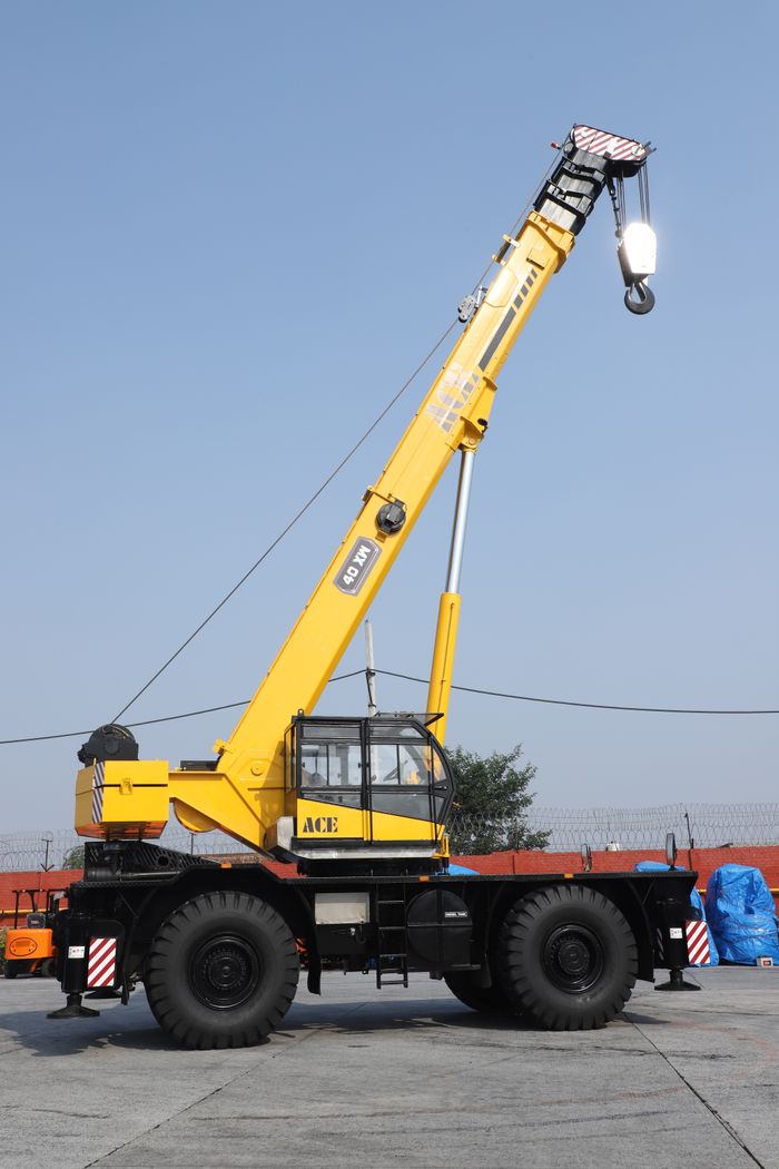 Home Yellow ACE 40 ton mobile crane in an industrial setting, Faridabad, India.